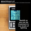 TENS unit with digital display on a wooden surface, highlighting its backlit screen feature.